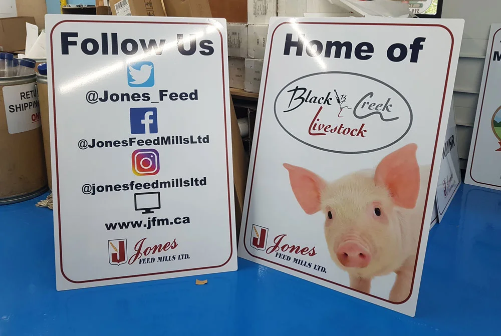 Printed promotional signs for a local feed business